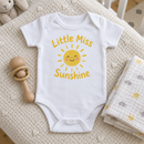 Lifestyle photo of the sunshine slogan baby grow in a UK home