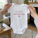 Lifestyle photo of the My First Mother's Day baby grow in a UK home