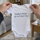 Lifestyle photo of the Daddy and baby first Father's Day baby grow in a UK home