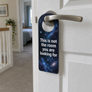Funny sci-fi door hanger on a bedroom door handle