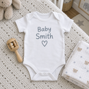 Lifestyle photo of the baby surname heart baby grow in a UK home