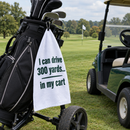 Funny golf towel hanging from a golf bag on a UK golf course
