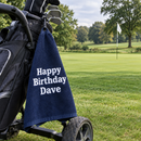 Personalised golf towel with a birthday message on a golf bag