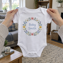 Lifestyle photo of the baby surname flower wheel baby grow in a UK home
