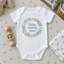 Lifestyle photo of the baby coming soon flower baby grow in a UK home