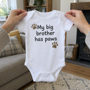 Lifestyle photo of the My Big Brother Has Paws baby grow in a UK home