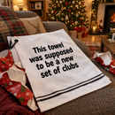 Funny golf gift towel unwrapped on Christmas morning