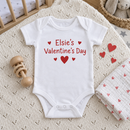 Lifestyle photo of the Valentine's Day baby grow with name in a UK home
