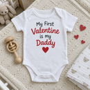 Lifestyle photo of the My First Valentine is my Daddy baby vest in a UK home