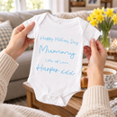 Personalised Mother's Day baby grow lifestyle photo with Happy Mother's Day Love From Daddy & Baby design in blue, printed with baby's name