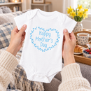 Personalised Mother's Day baby grow lifestyle photo with Heart Wheel design in blue, printed with baby's name