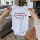 Lifestyle photo of the Mummy's little Valentine baby grow and year in a UK home