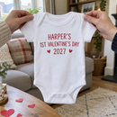 Lifestyle photo of the 1st Valentine's Day baby grow with name in a UK home