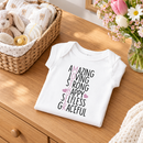 Personalised Mother's Day baby grow lifestyle photo with Amazing Mother design in pink, printed with baby's name