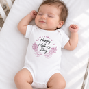 Personalised Mother's Day baby grow lifestyle photo with Happy Mother's Day Floral design in pink, printed with baby's name