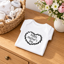 Personalised Mother's Day baby grow lifestyle photo with Heart Wheel design in black, printed with baby's name