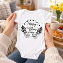 Personalised Mother's Day baby grow lifestyle photo with Happy Mother's Day Floral design in black, printed with baby's name