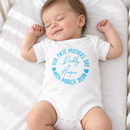 Personalised first Mother's Day baby grow lifestyle photo with Our 1st Mother's Day Classic design in blue, printed with baby's name