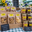 Market stall cookie bags with yellow allergy labels for milk and gluten