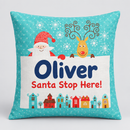 Turquoise Santa and reindeer cushion printed with the name Oliver and Santa Stop Here