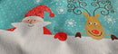 Close-up of the Santa and reindeer print on the cushion cover