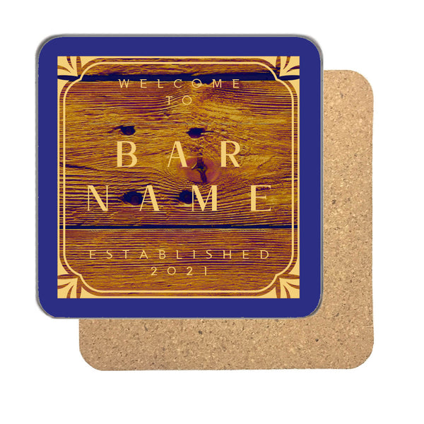 Personalised rustic established coaster with a warm wood effect, Welcome To, a bar name and Established year in gold