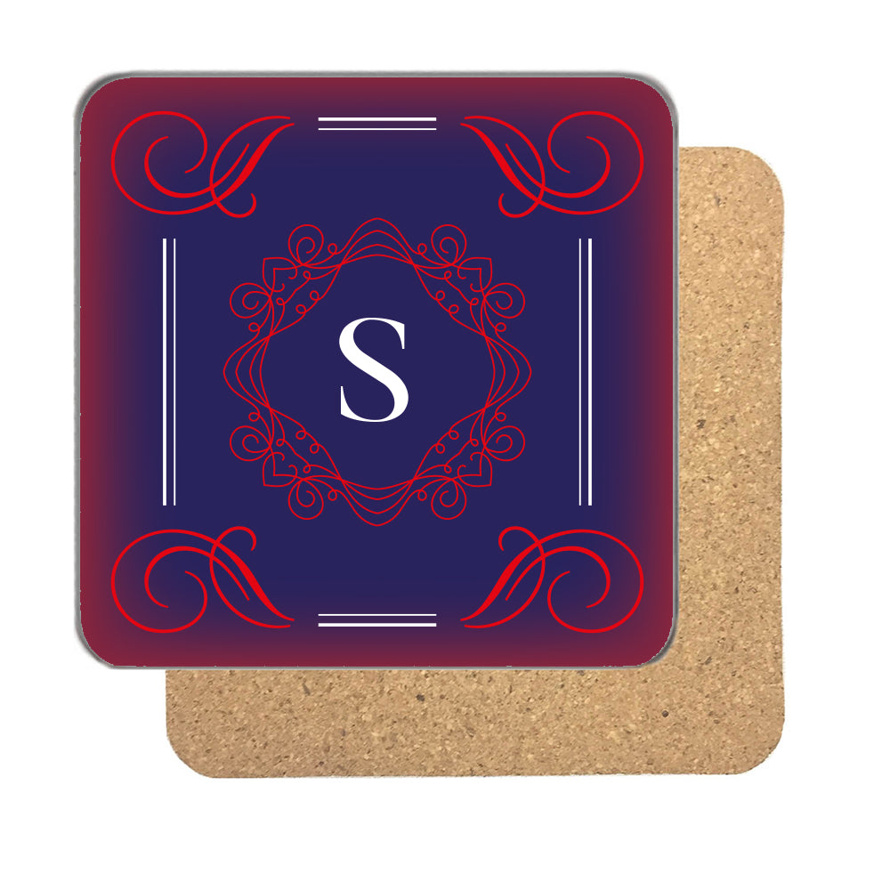 Personalised initial coaster with a large white serif letter inside a red monogram frame on midnight blue